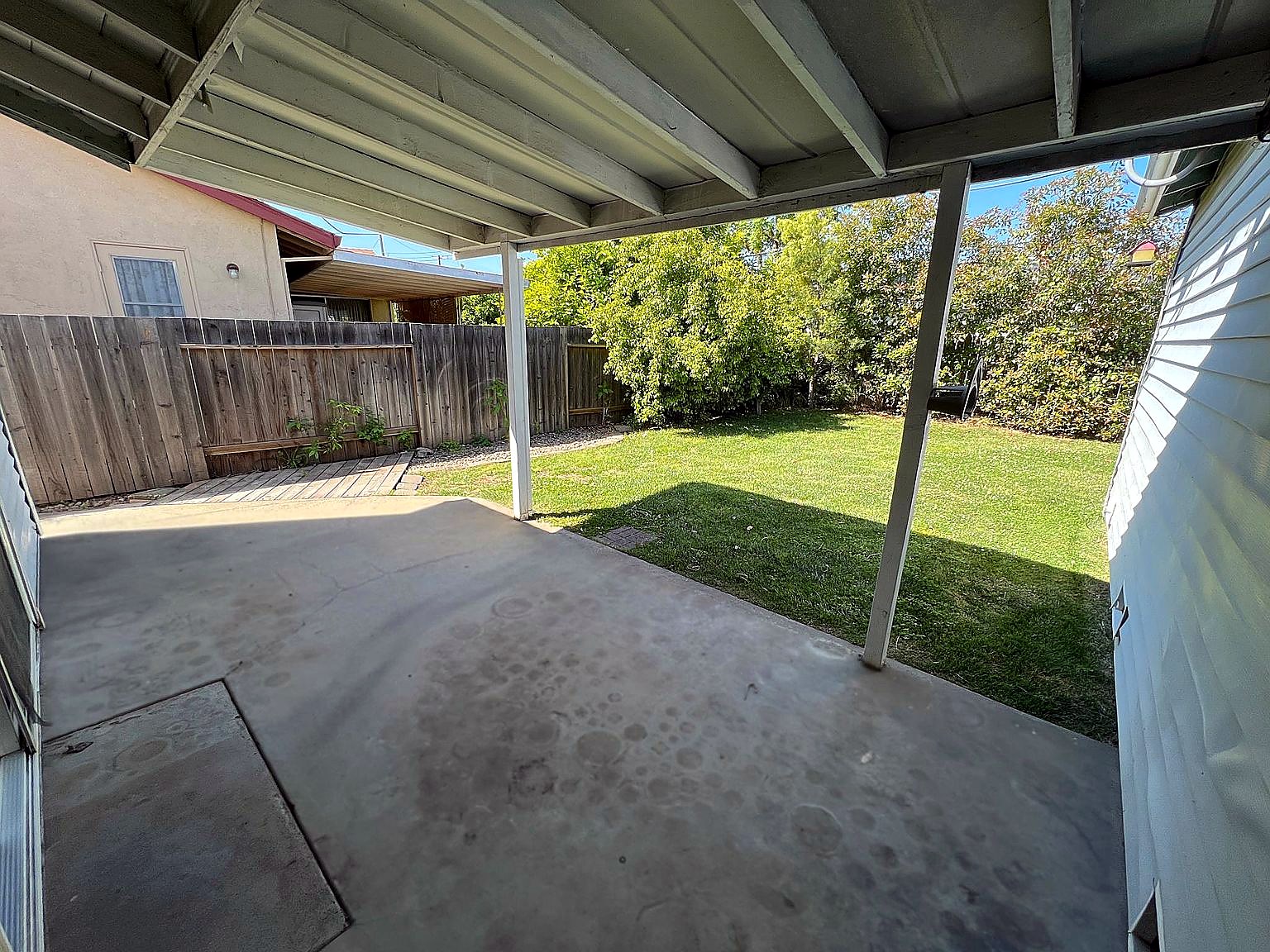 Private backyard and covered patio at 2908 Notre Dame Drive